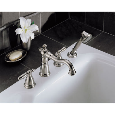 Delta Victorian Collection Stainless Steel Finish Traditional Roman Tub Filler Faucet with Hand Shower INCLUDES (2) Lever Handles and Rough-in Valve D1420V